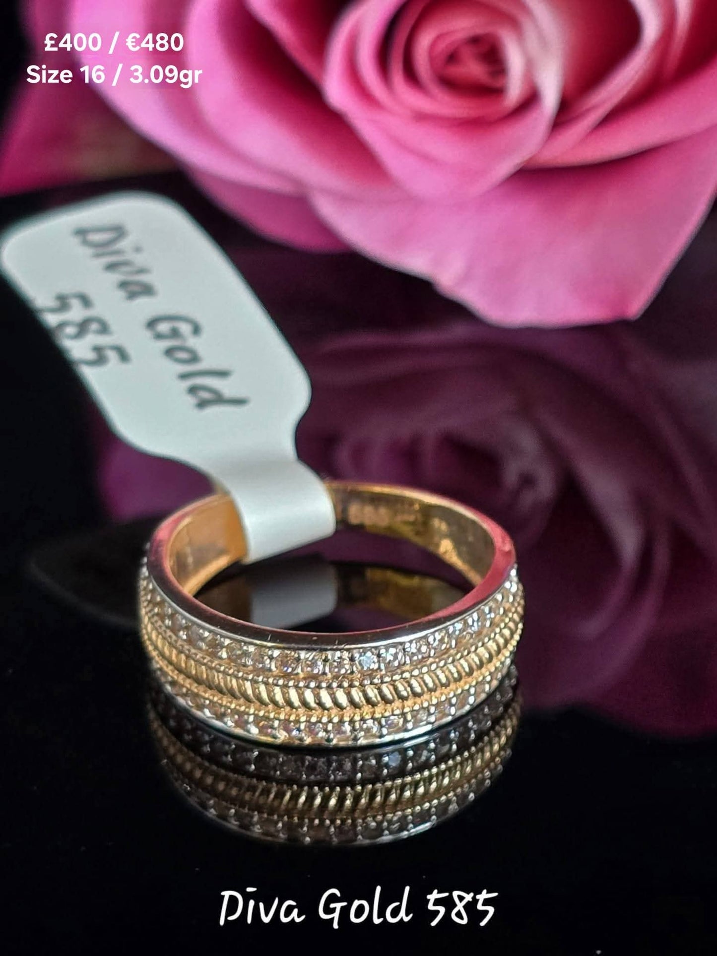 Gold women ring. White zircon stones.Size 16