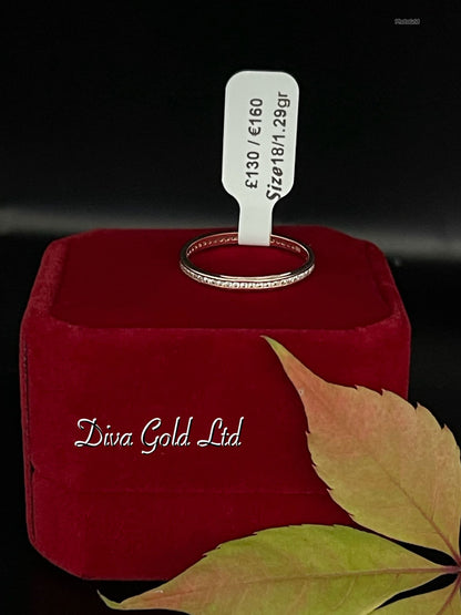 Gold ring with zircon stones. Size 18