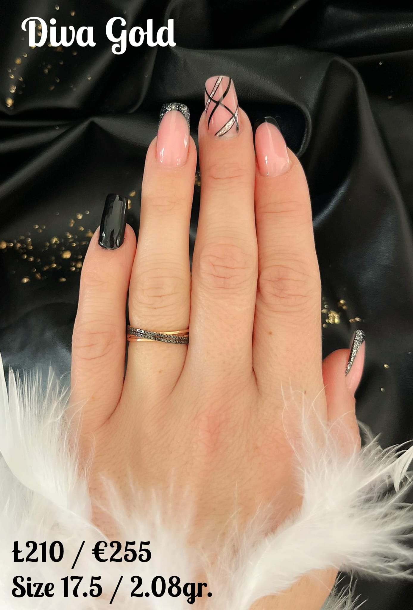 Gold ring with black zircon stones.  Size 17.5