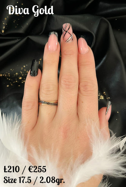 Gold ring with black zircon stones.  Size 17.5