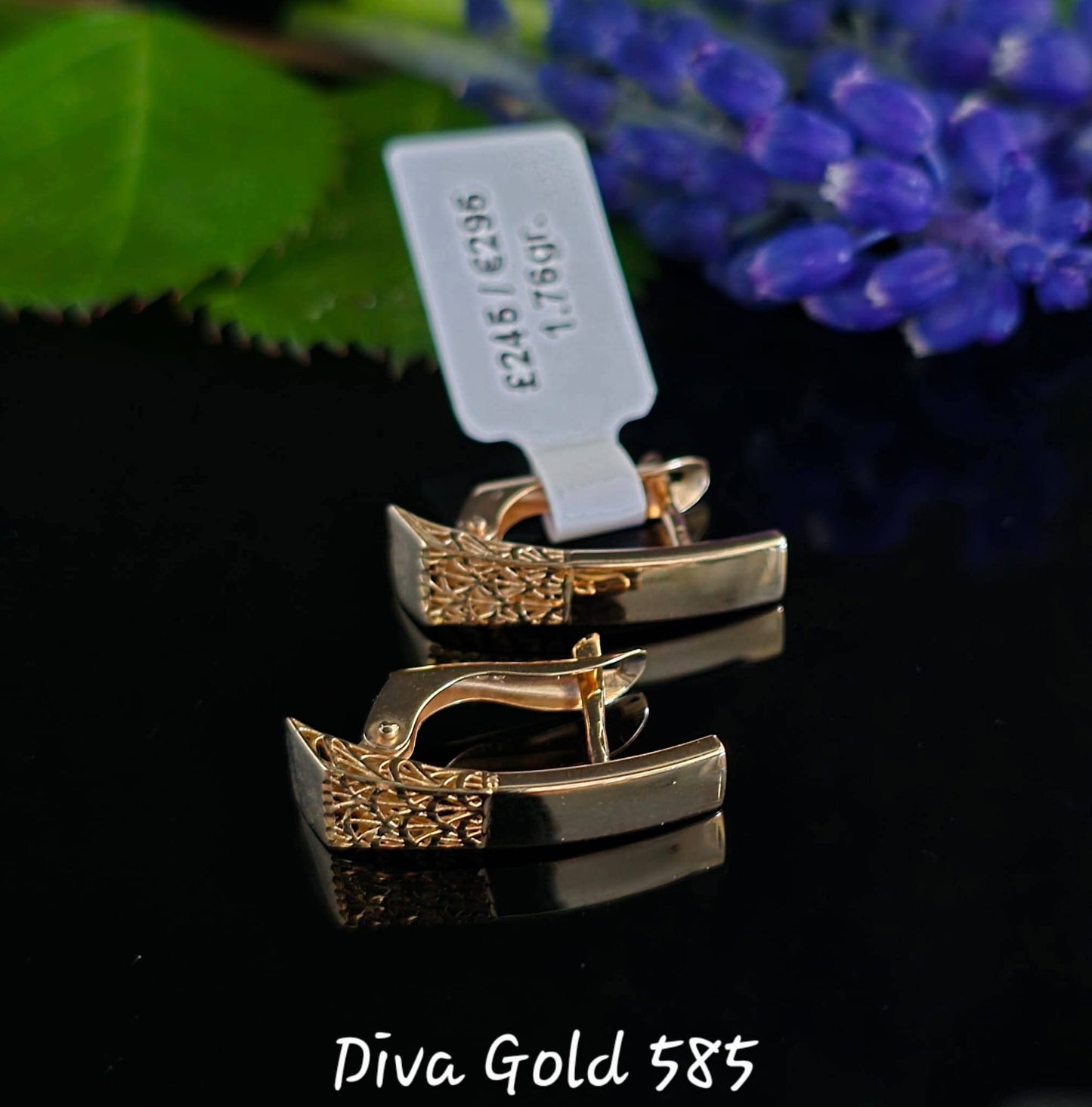 585 Gold earrings. 1.76gr