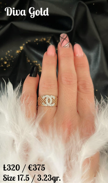 Gold chanel ring with white zircon stones.  Size 17.5