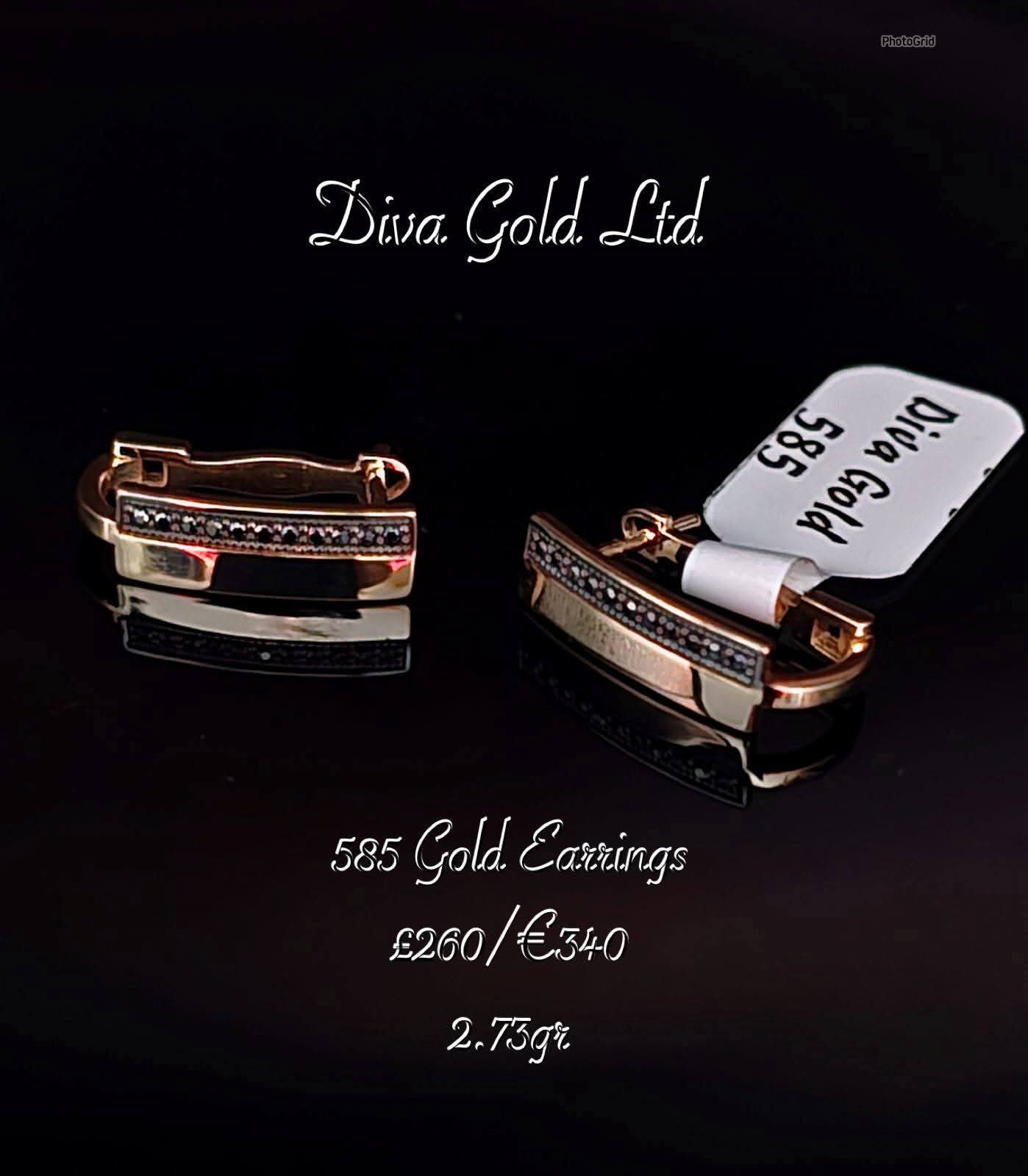 Gold 585 earrings with black zircon stones.