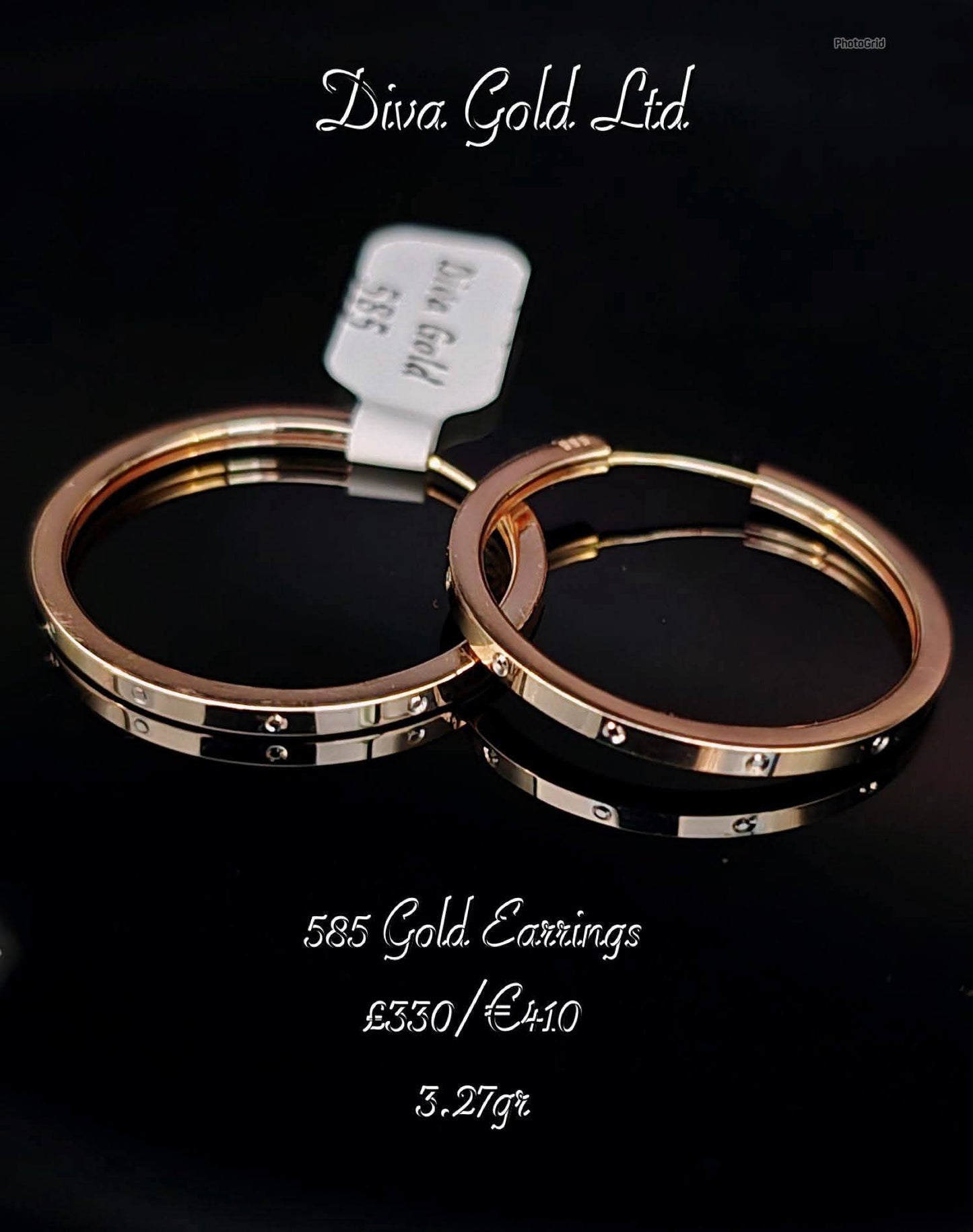 Gold 585 hoop earrings with white zircon stones.