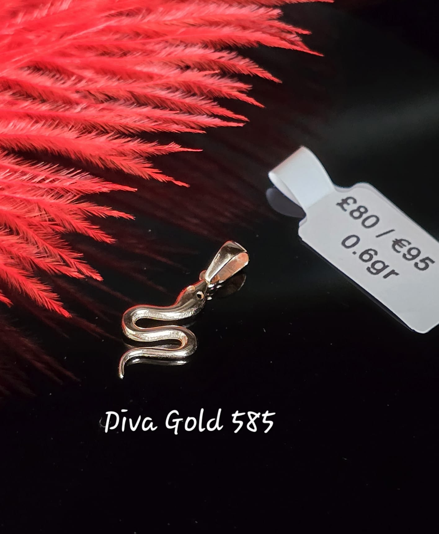 585 Gold snake pendant 0.60gr