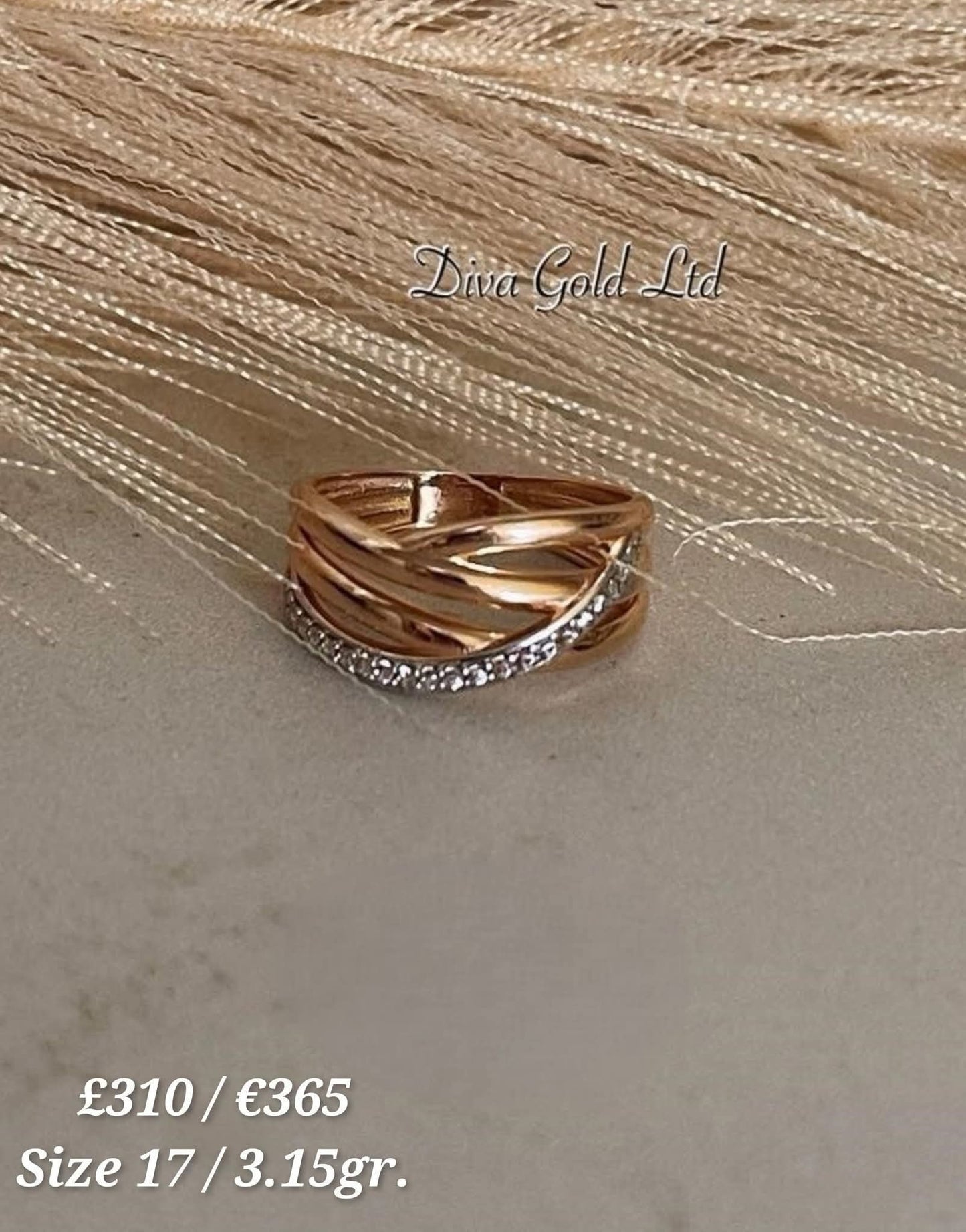 Gold ring with white zircon stones. Size 17