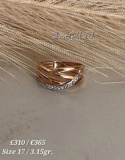 Gold ring with white zircon stones. Size 17