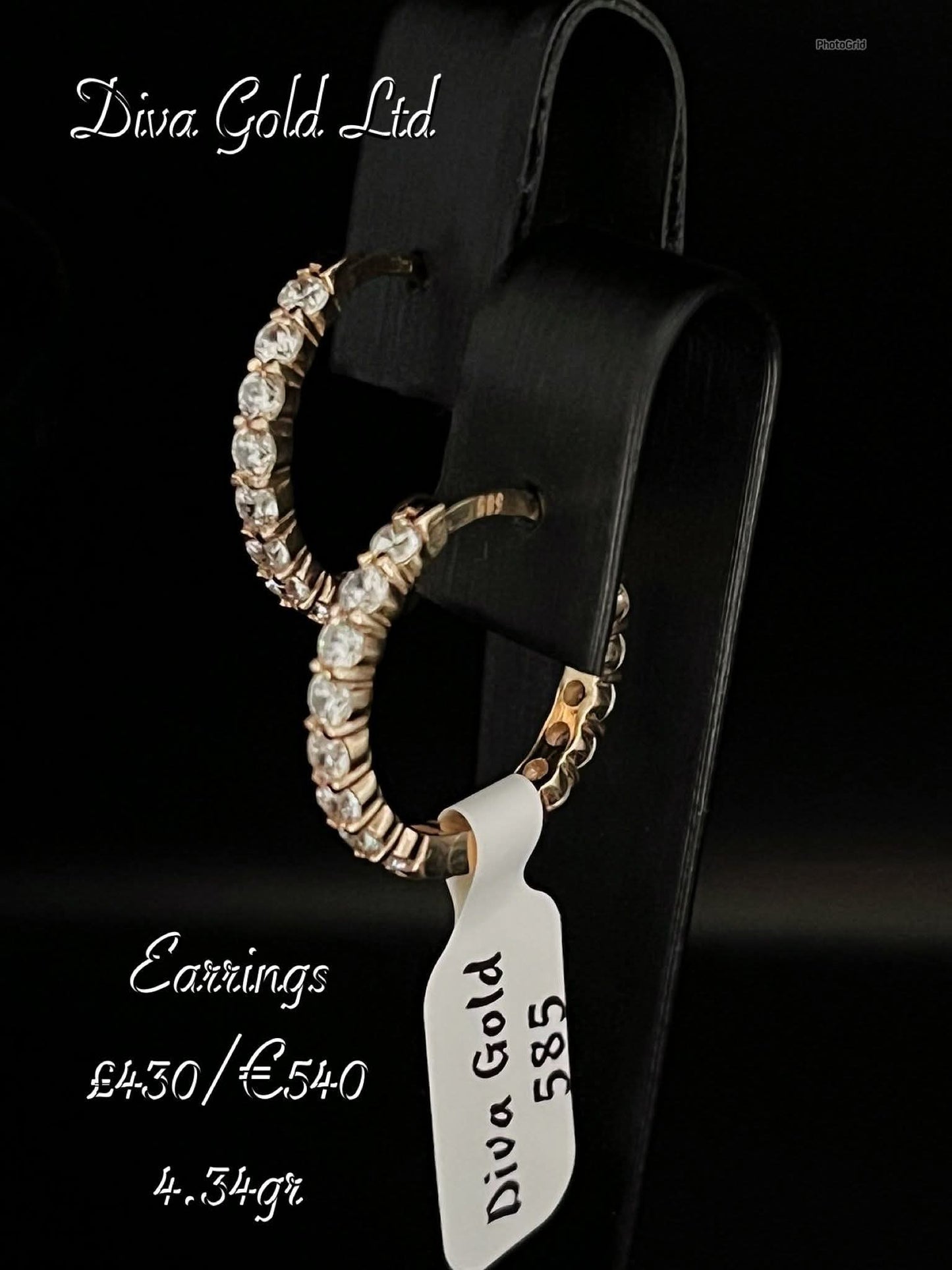 Gold 585 earrings with zircon stones.