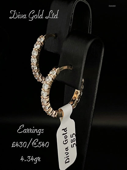 Gold 585 earrings with zircon stones.