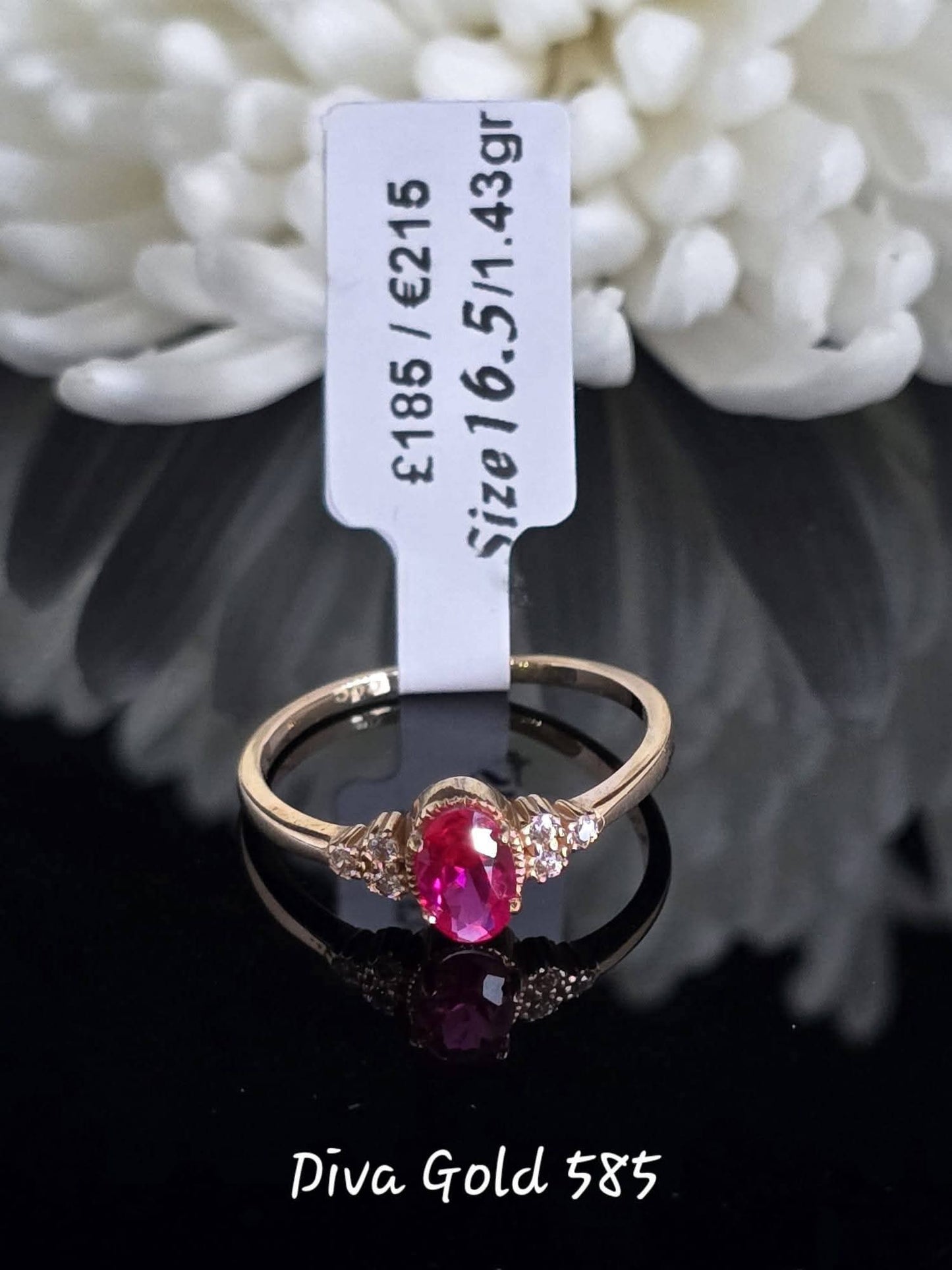 Gold women ring. Pink&white zircon stones.Size 16.5