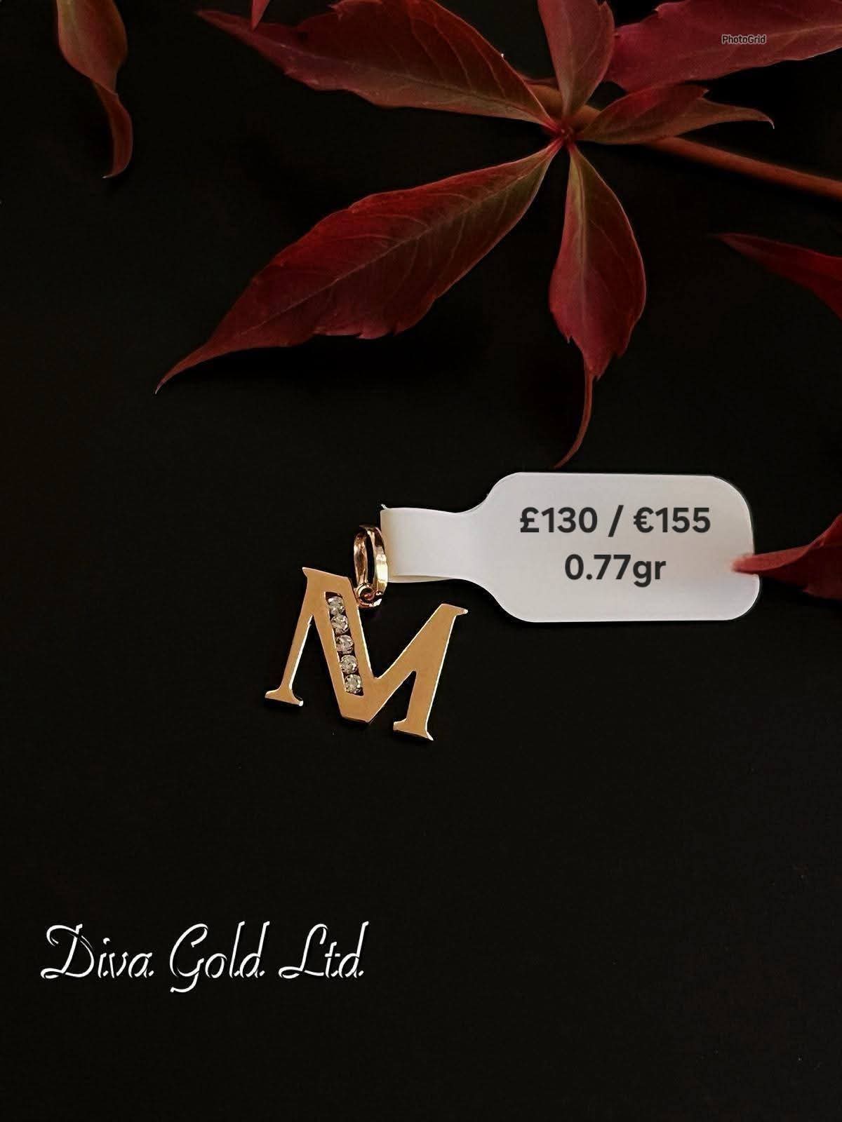 585 Gold letter M pendant. 0.77gr