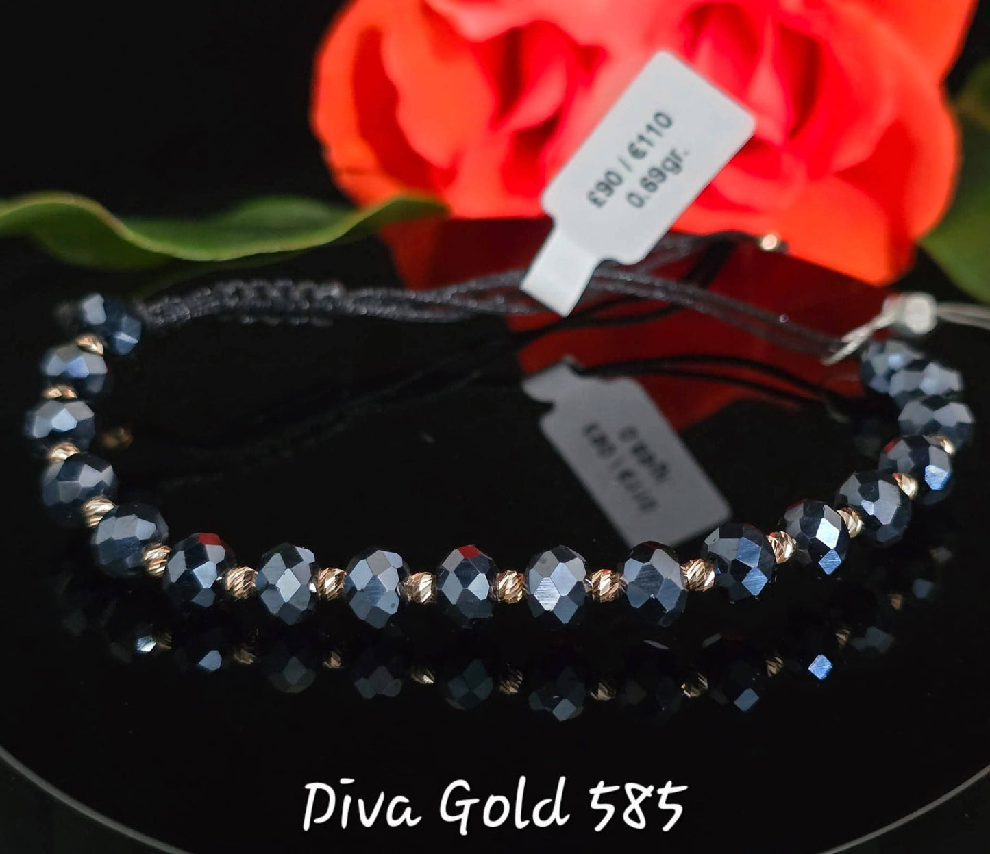 black thread bracelet with 585 gold details / blue beads