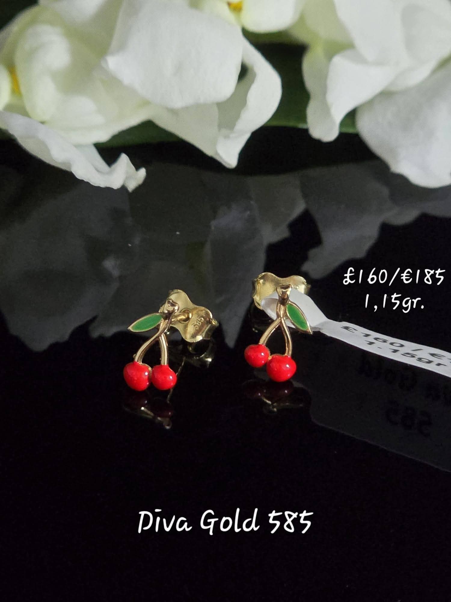 Stud gold earrings.