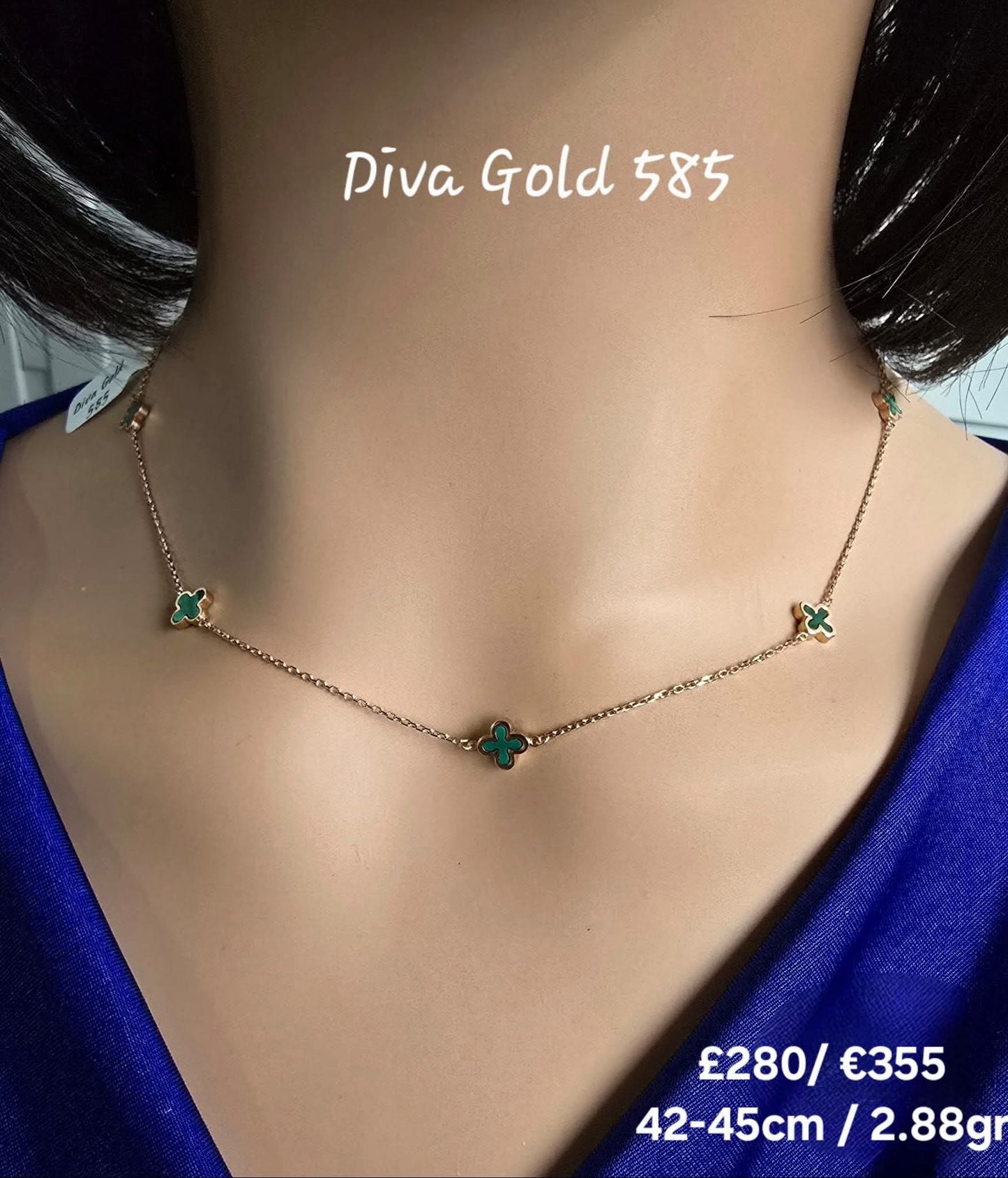 Gold chain with green clover pendants. 42-45cm