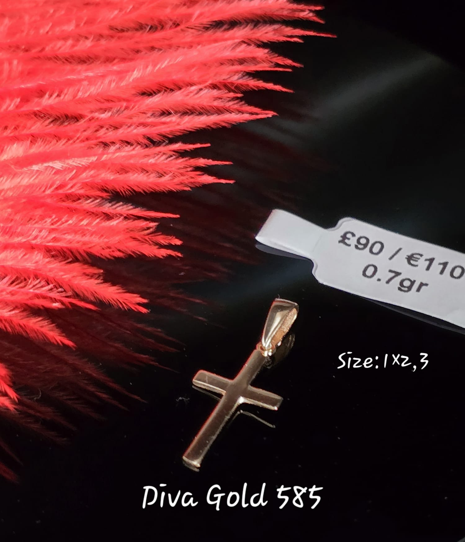 585 Gold cross. 0.70gr