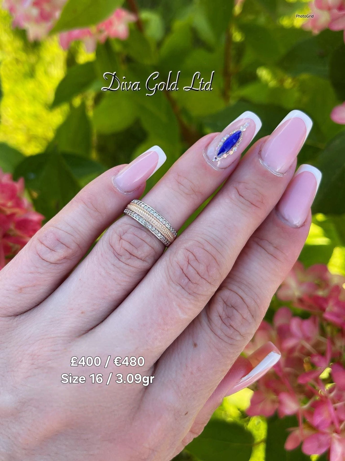 Gold women ring. White zircon stones.Size 16