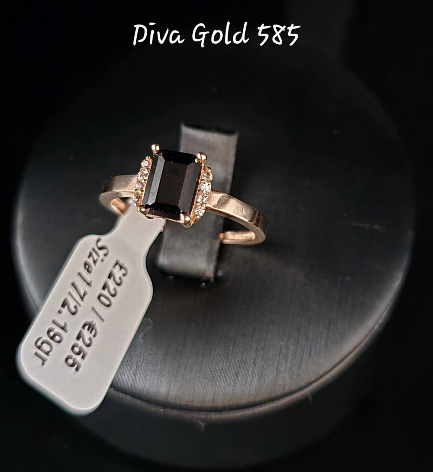 Gold ring with black zircon stones. Size 17