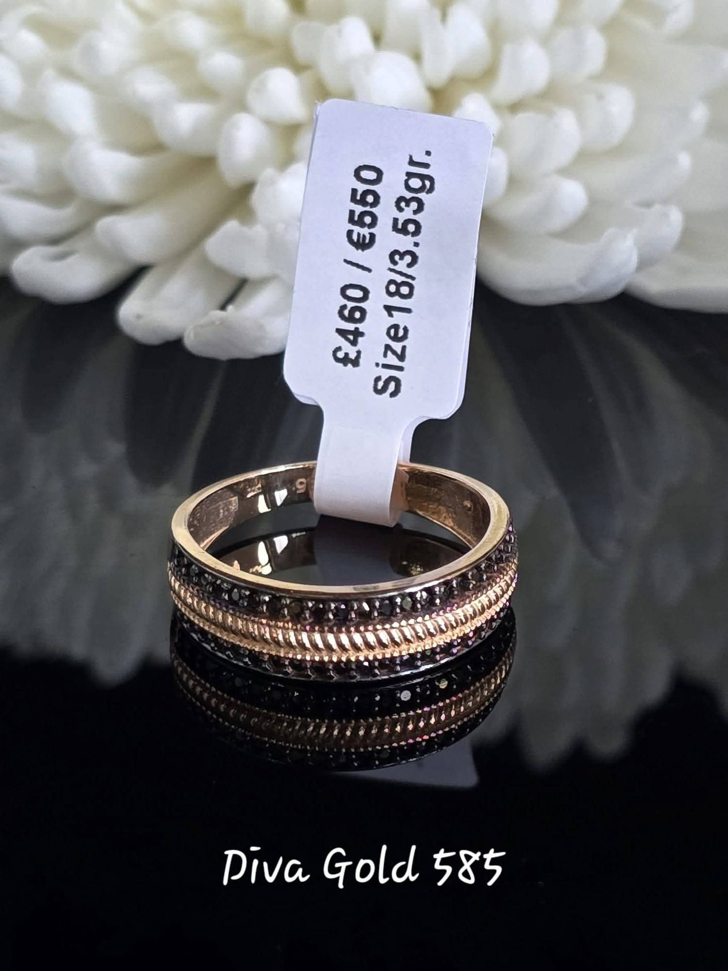 Gold women ring with black zircon stones. Size 18