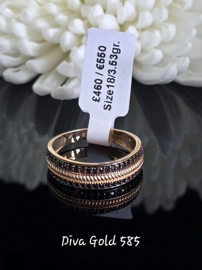Gold women ring with black zircon stones. Size 18