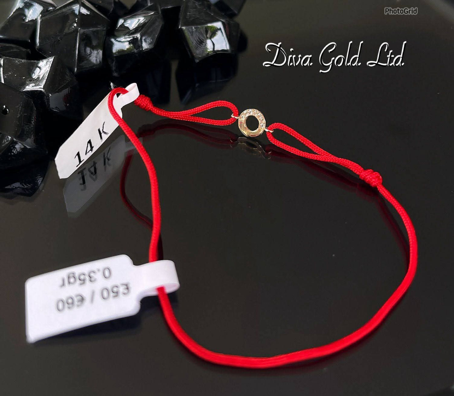 Red thread bracelet with 585 gold details. 0.35gram