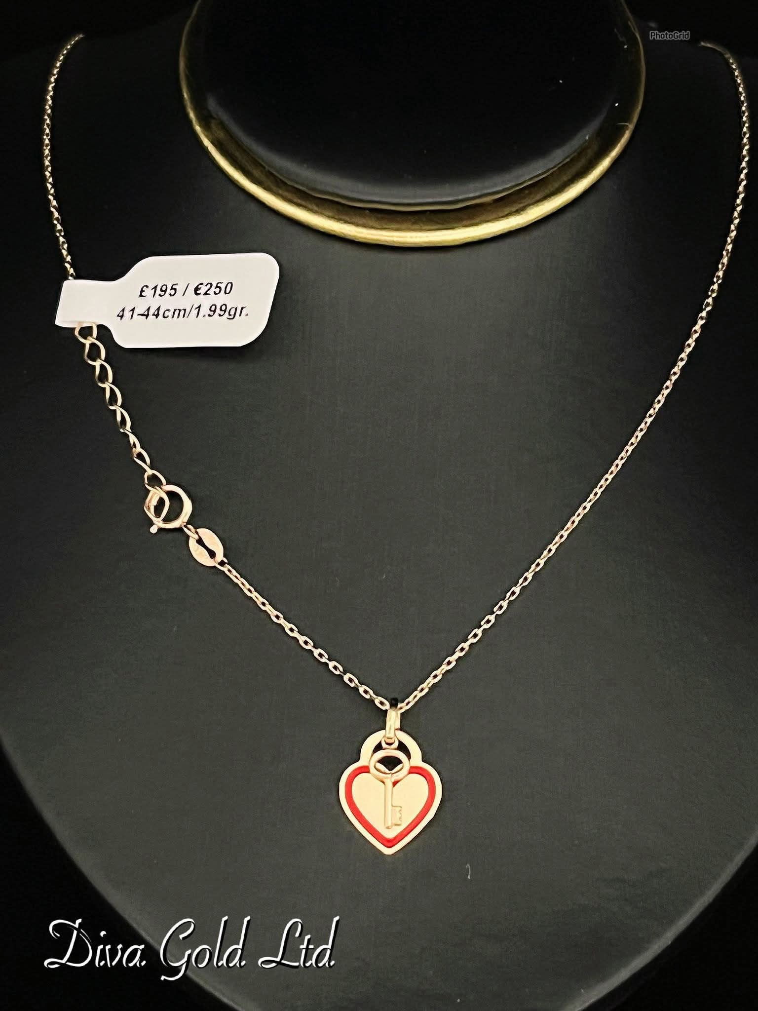 Gold chain with heart pendant. 41-44cm