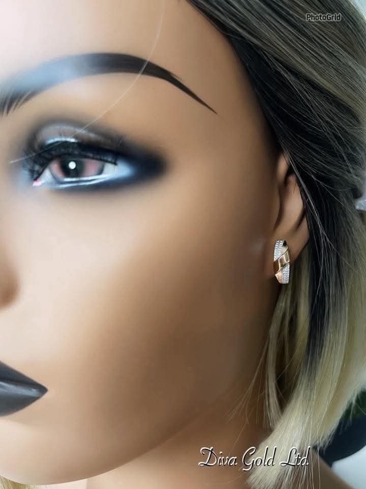 Gold 585 earrings with white zircon stones.