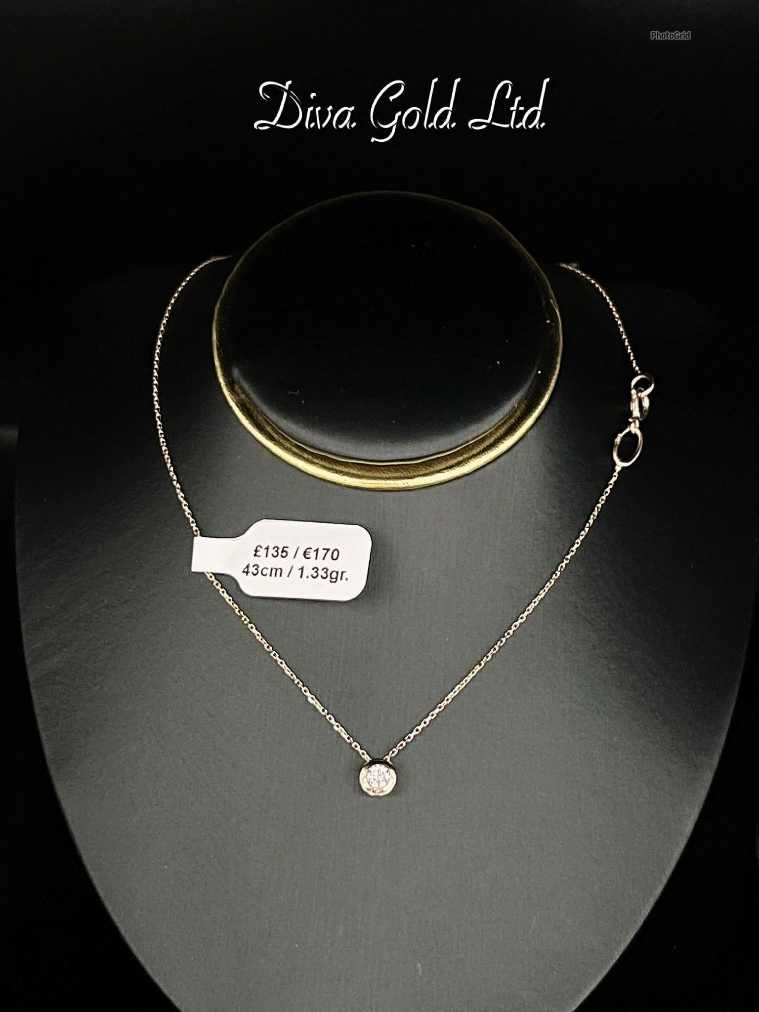 Gold chain with white zircon stone. 43cm