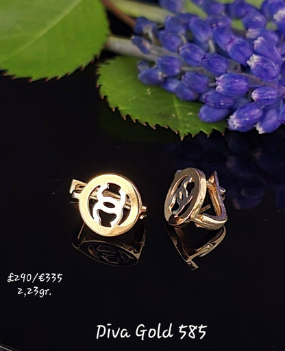 585 Gold chanel earrings. 2.23gr
