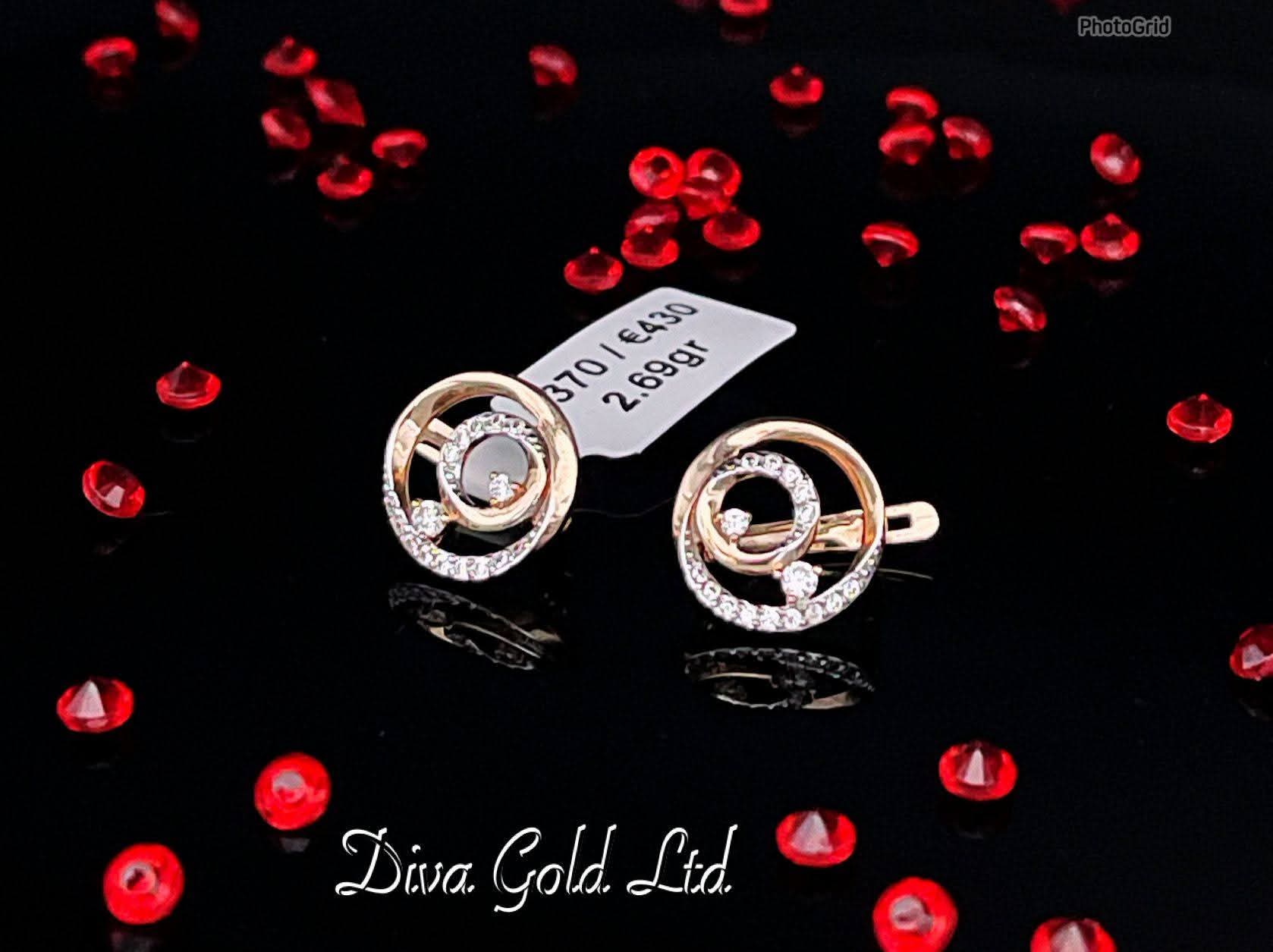 585 Gold earrings with white zircon stones. 2.69gram