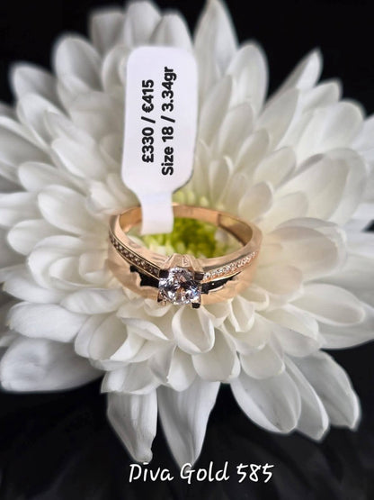 Gold Ring with zircon stones. Size 18