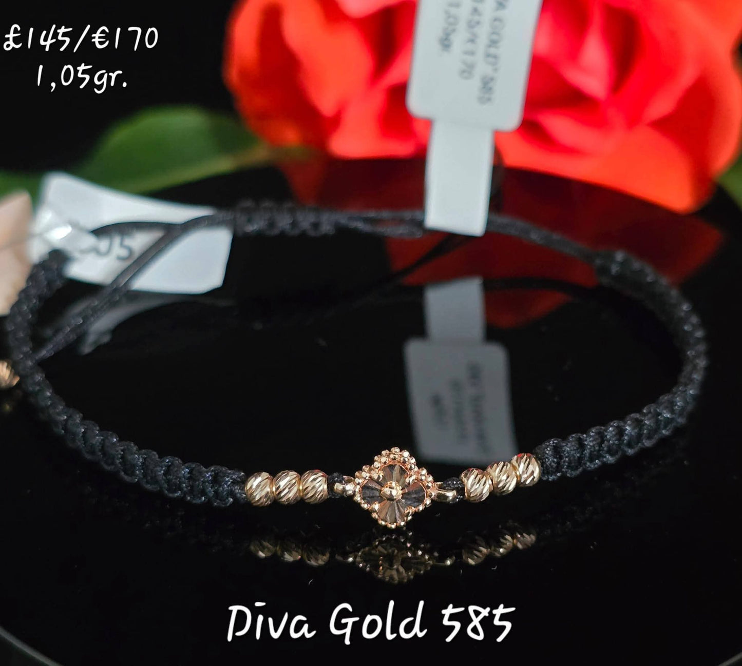 Clover thread bracelet with 585 gold details.