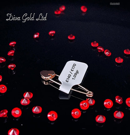 Gold brooch. 1.09gr