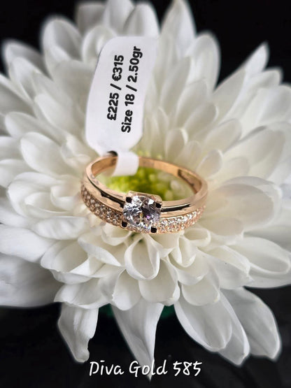 Gold 585 ring with white zircon stones. Size 18