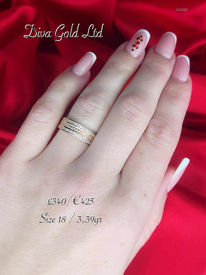 Gold ring with zircon stones. Size 18