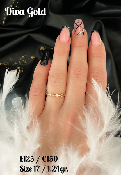 Gold ring with white zircon stones. Size 17