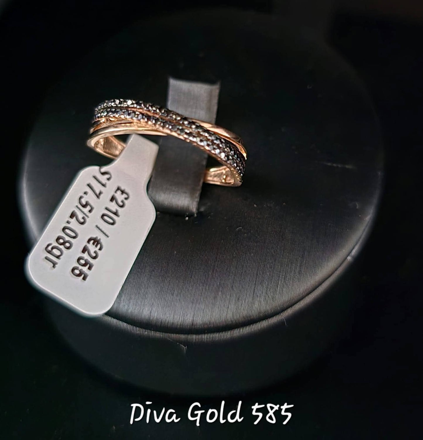 Gold ring with black zircon stones.  Size 17.5