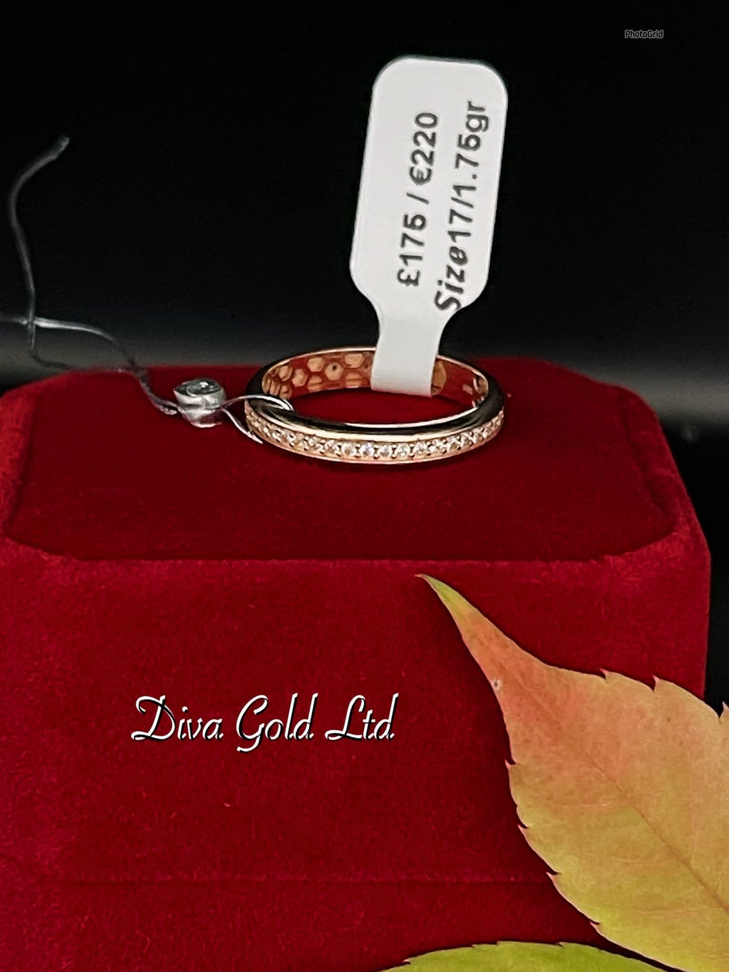 Gold ring with white zircon stones.  Size 17