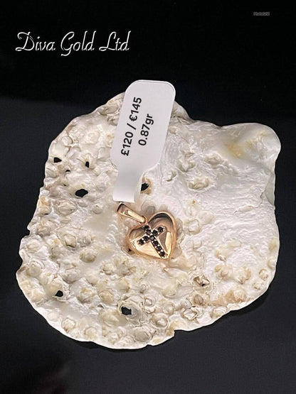 585 Gold heart with cross pendant. 0.87gr