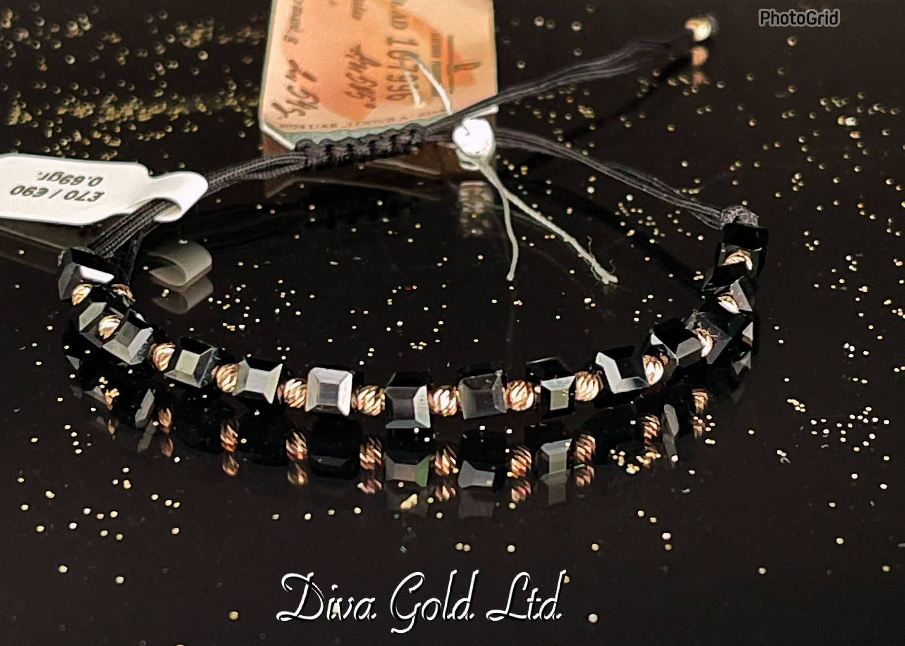 Black thread bracelet with gold details.