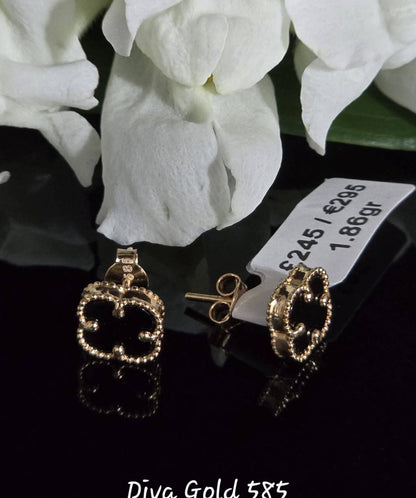 Stud black clover gold earrings.