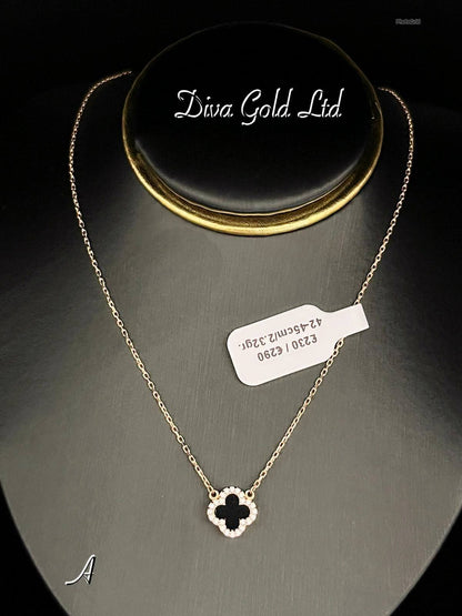 Gold chain with black pendant clover and white zircon stones. 42-45cm