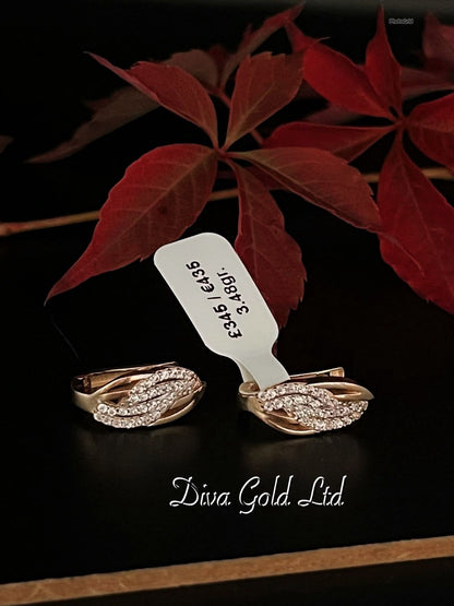 Gold 585 earrings with white zircon stones.