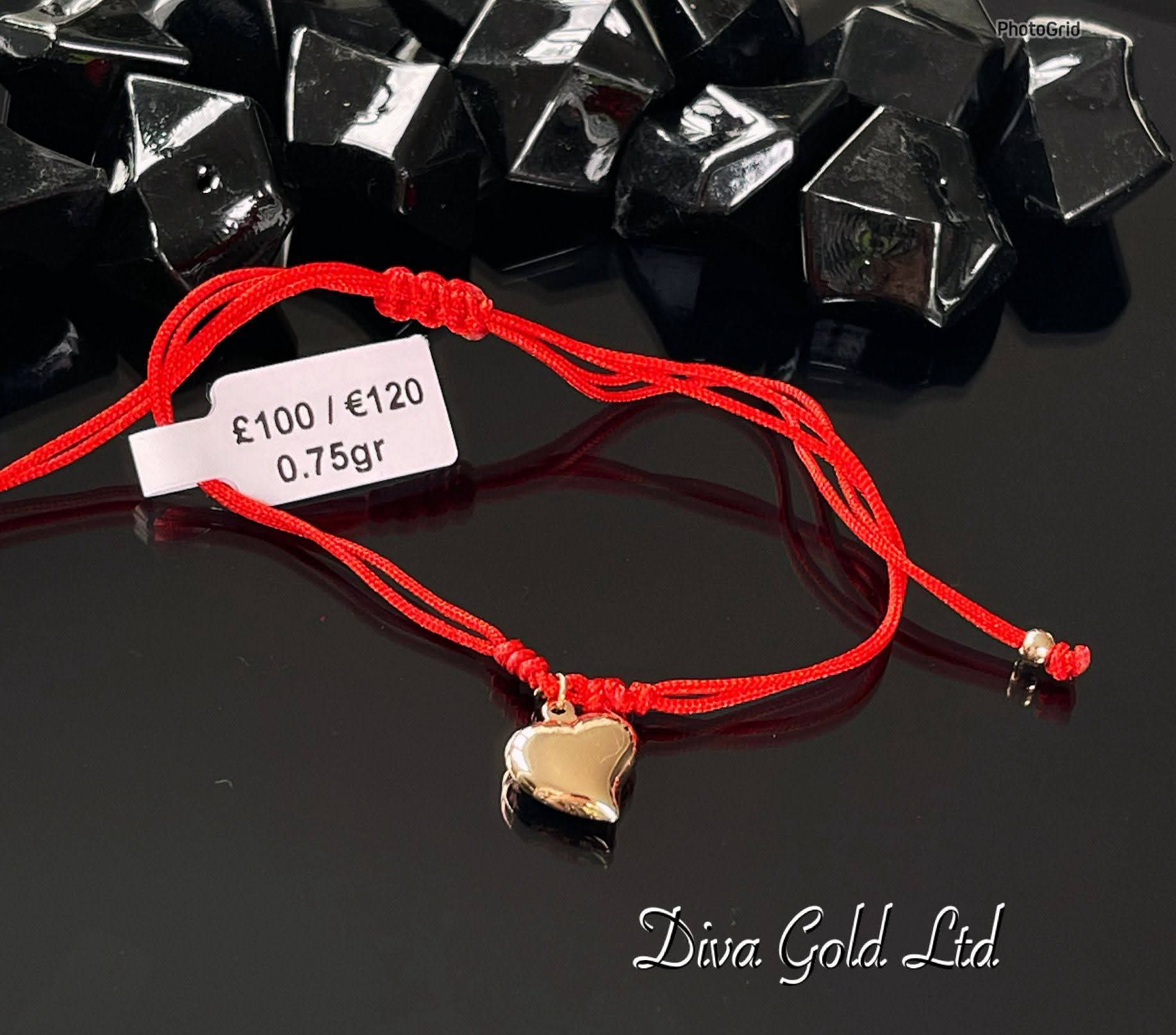 Red thread bracelet with 585 gold details. 0.75gram