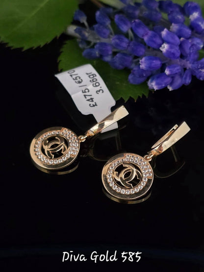 585 Gold chanel earrings. 3.66gr