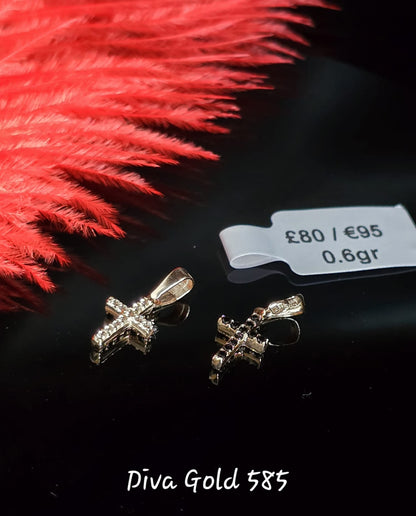 585 Gold double sided cross. 0.60gr