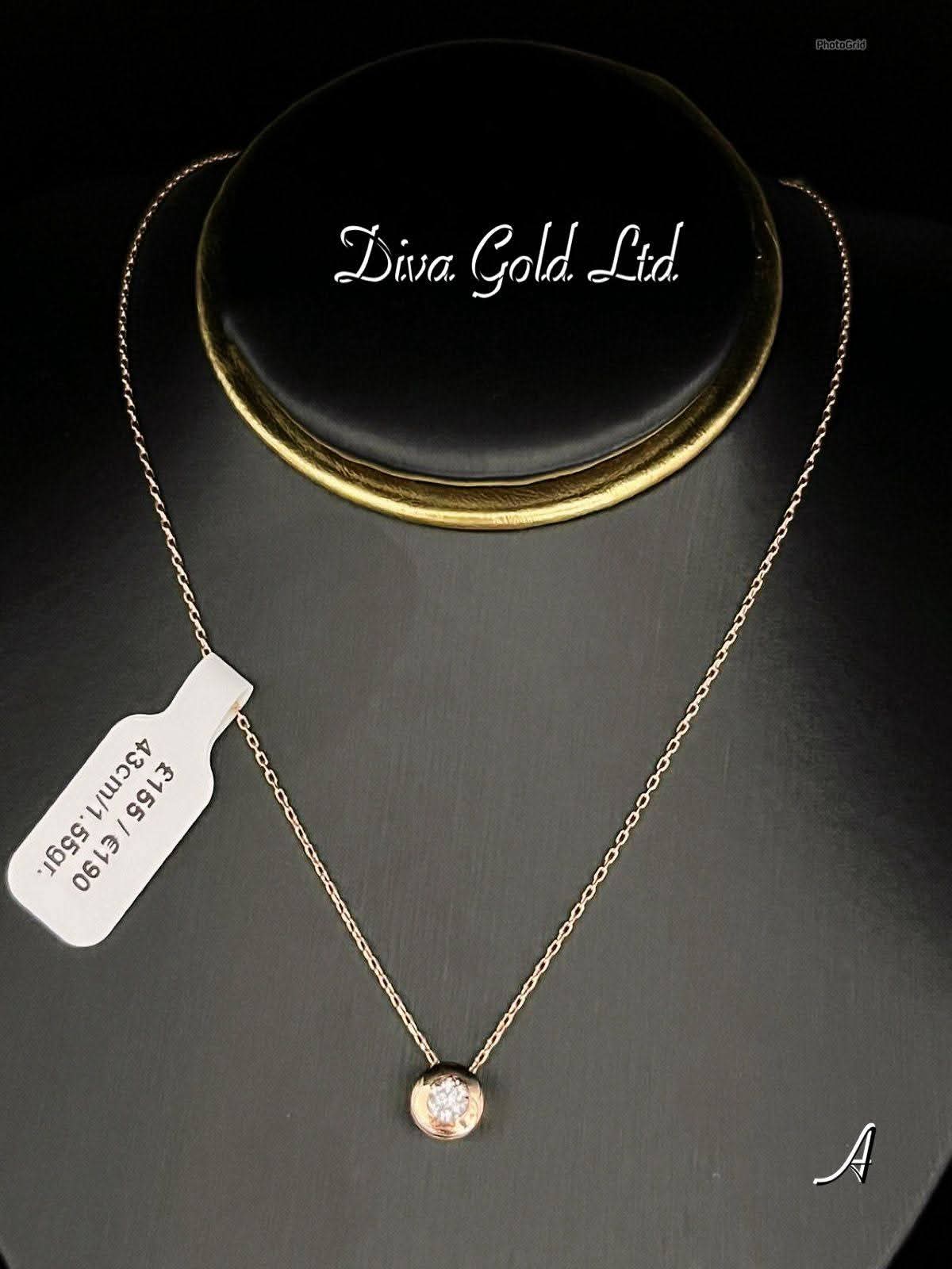 Gold chain with zircon stone pendant. 43cm