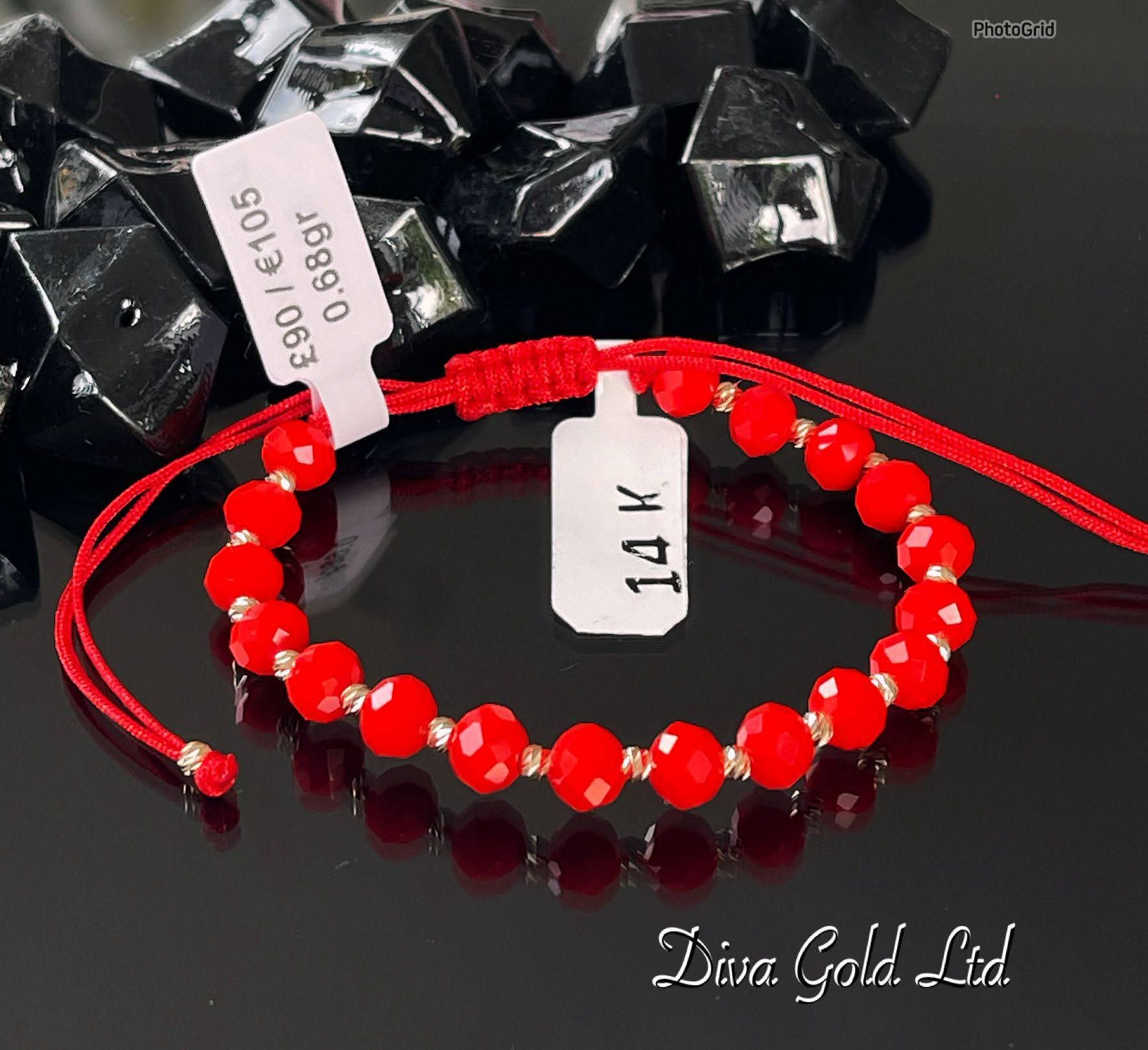 Red thread bracelet with 585 gold details. 0.68gram