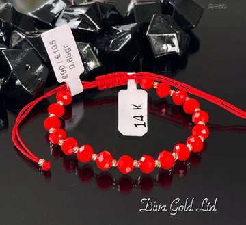 Red thread bracelet with 585 gold details. 0.68gram
