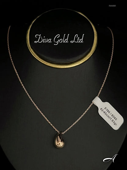 Gold chain with pendant. 42-45cm