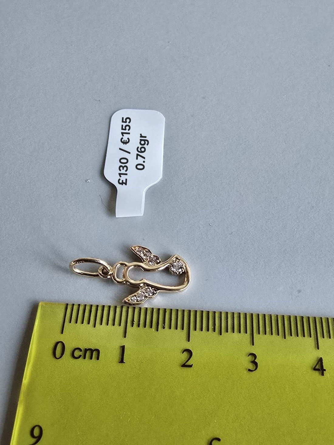 585 Gold Angel pendant. 0.76gr